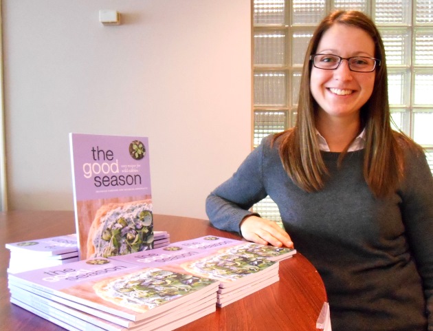 Michelle Arseneault sells copies of her cookbook "The Good Season"