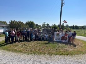 Outdoor group photo of the students on the 2023 Midwest Tour at the Farm Connection