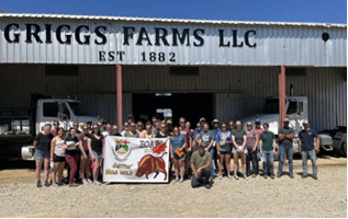 The Midwest Tour 2023 posing in front of Griggs Farms LLC