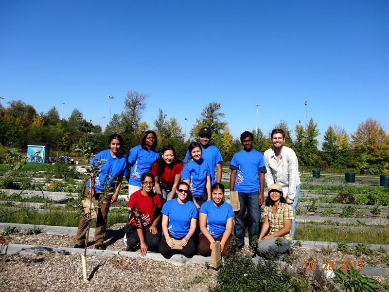 Paul Wartman, taking McMaster Serves students on a tour of the Edible Forest Garden 