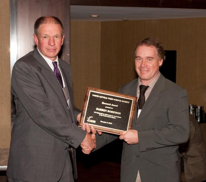 Darren Robinson accepting award