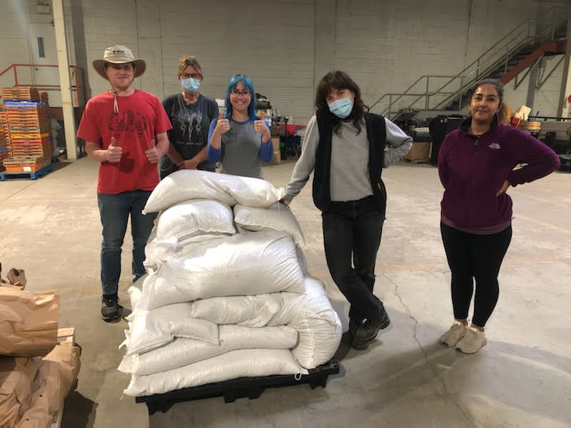 From left to right - Alec Schaefer (PAG),  Kari Badgerow (SEED Good Food Distribution Coordinator), Natalie Arsenault (PAG), Natalie Salter (SEED Assistant), Yasmine Gheshlaghi (SEED Food Surplus Lead)