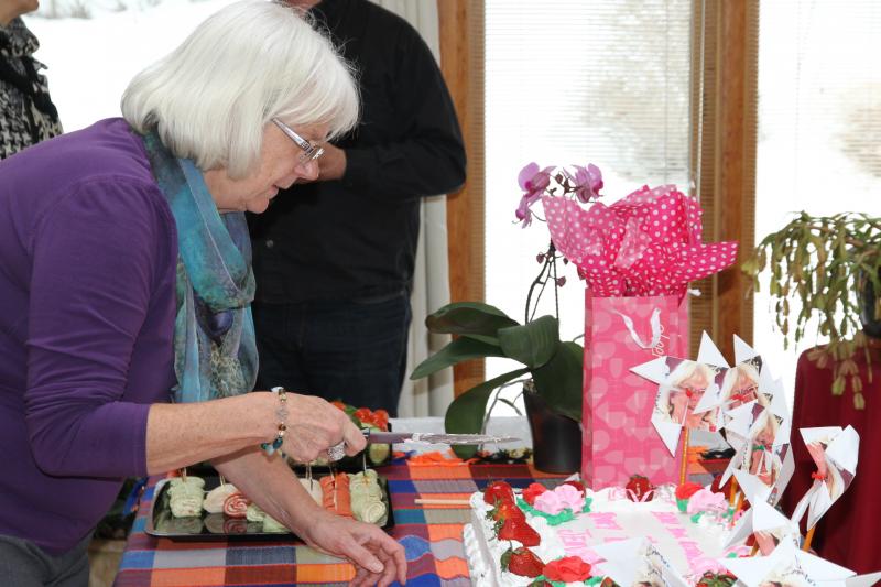 Jenny cutting her birthday cake