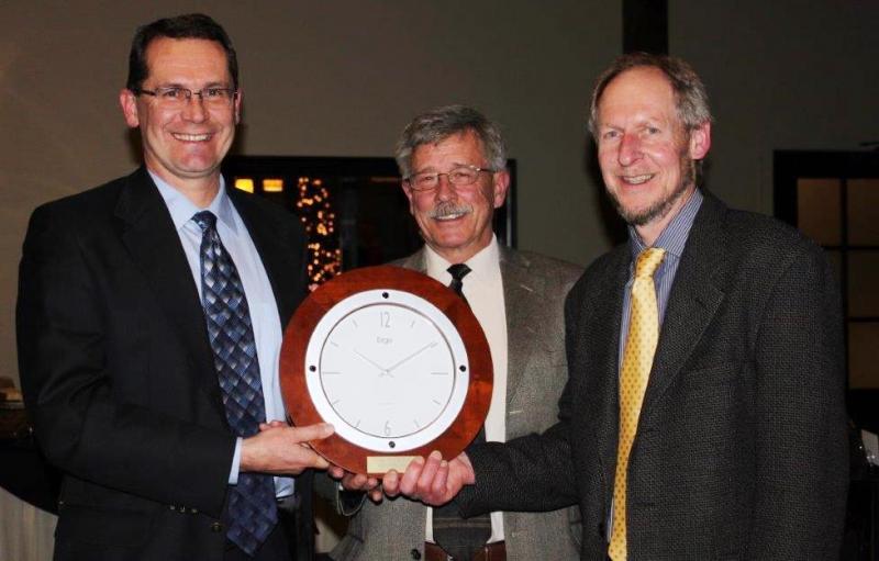 Presentation of clock to commemorate the 20th year of commercial use of OAC Bayfield soybean