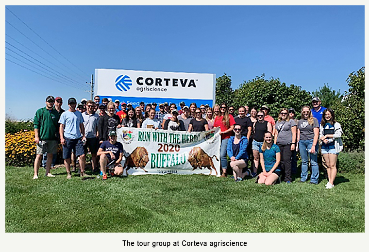 The tour group in front of Corteva agriscience sign