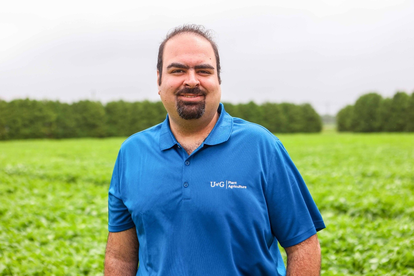 Mohsen Yoosefzadeh Najafabadi standing in field 