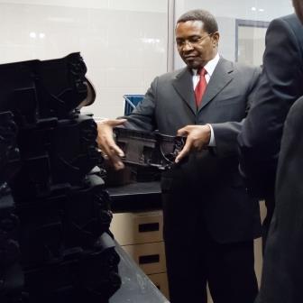 president Jakaya Kikwete viewing a BDDC produced product