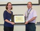 Andrea Hitchon receiving CSA Pest Management Award from Dr. Gavin Humphreys
