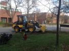 Tractor on grass in front of the Crop Science building