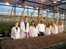 Students in research greenhouse