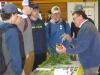 Rodger Tschanz speaking with a group of high school students