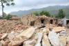 Photo of earthquake devastation in rural area.