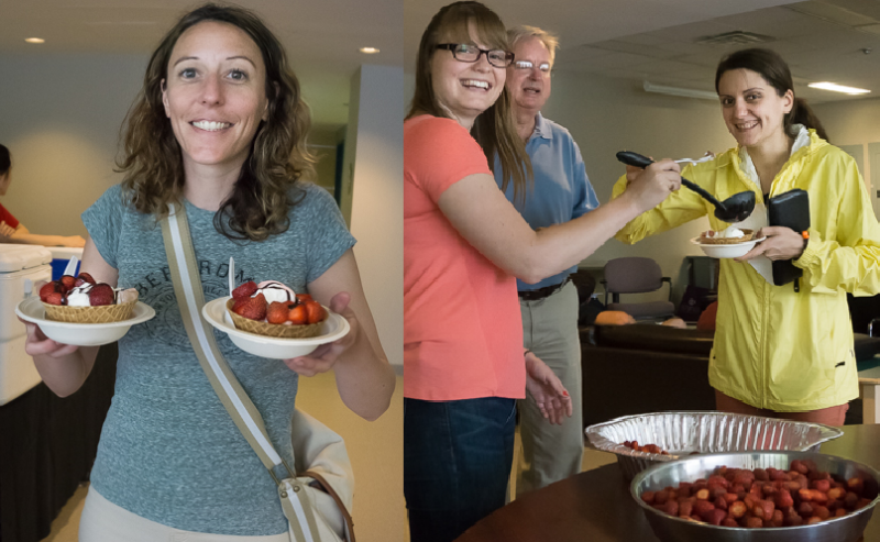 People enjoying fresh strawberries on top of ice cream at the Strawberry Social